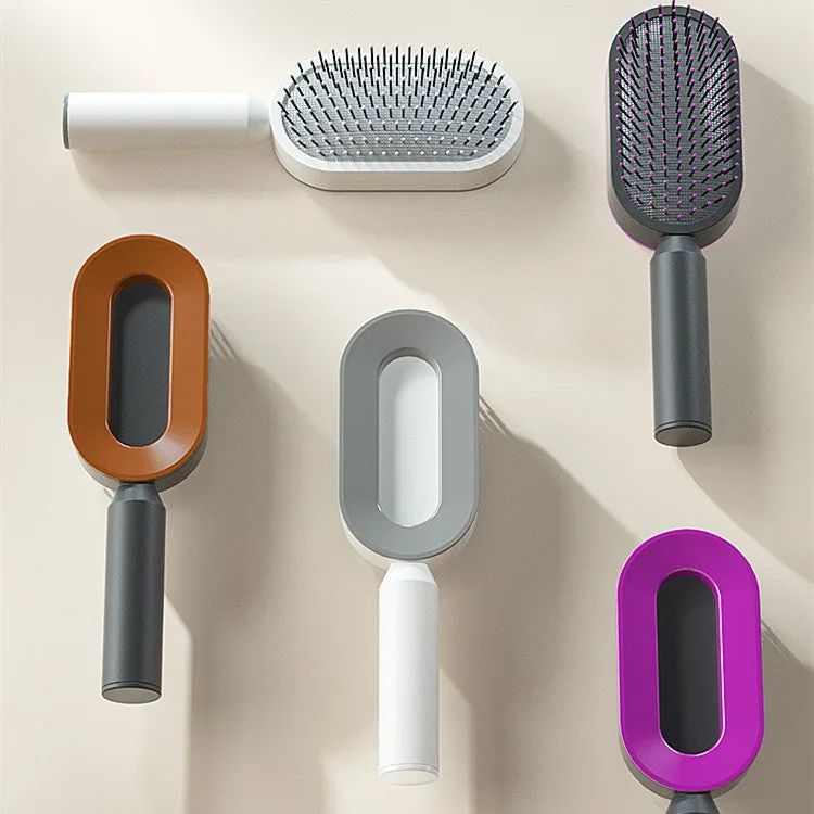 Self-cleaning hair brush with air cushion design in black gold, white, or black purple colours