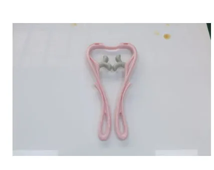 Blue manual swan-shaped neck massager with six rolling wheels and a natural crystal jade scraping board on a white background.