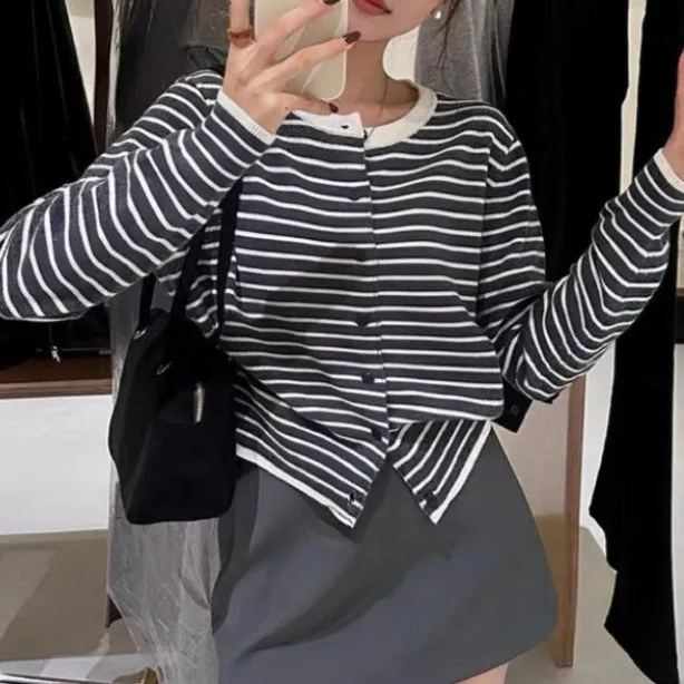 Dark gray and white striped women's cardigan coat with long sleeves and a slim fit.