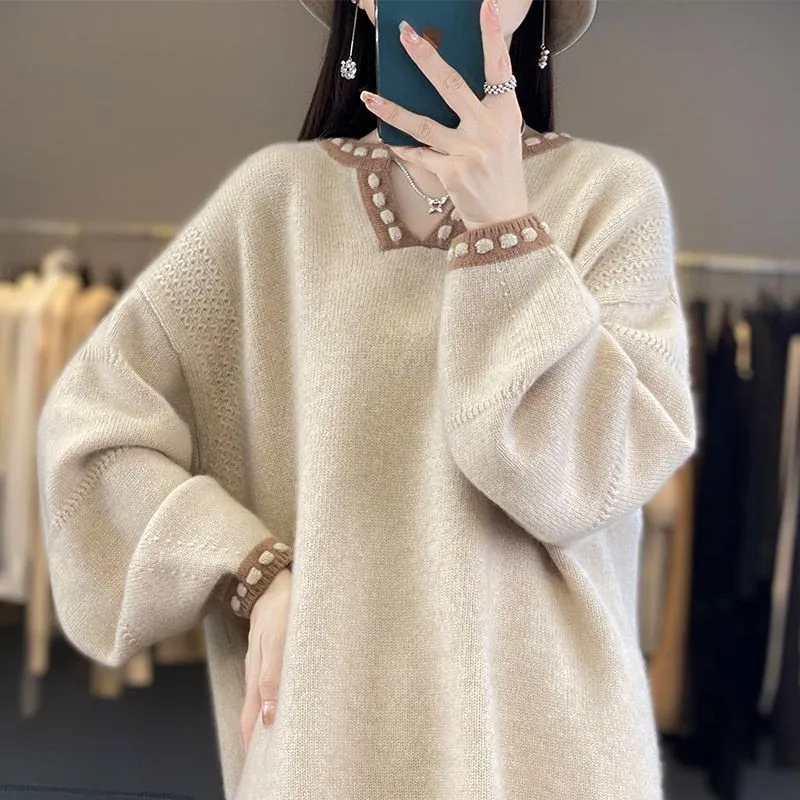 Women's camel coloured V-neck long sleeve viscose pullover sweater on a hanger.