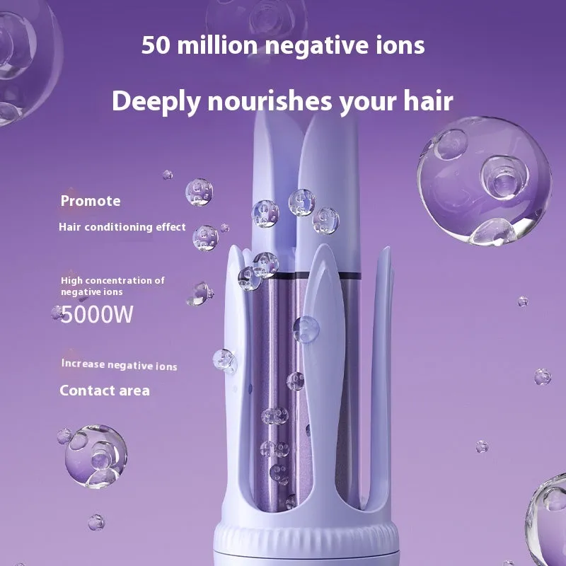 Pink automatic hair curler with 32mm barrel, three clips, and comb on white background