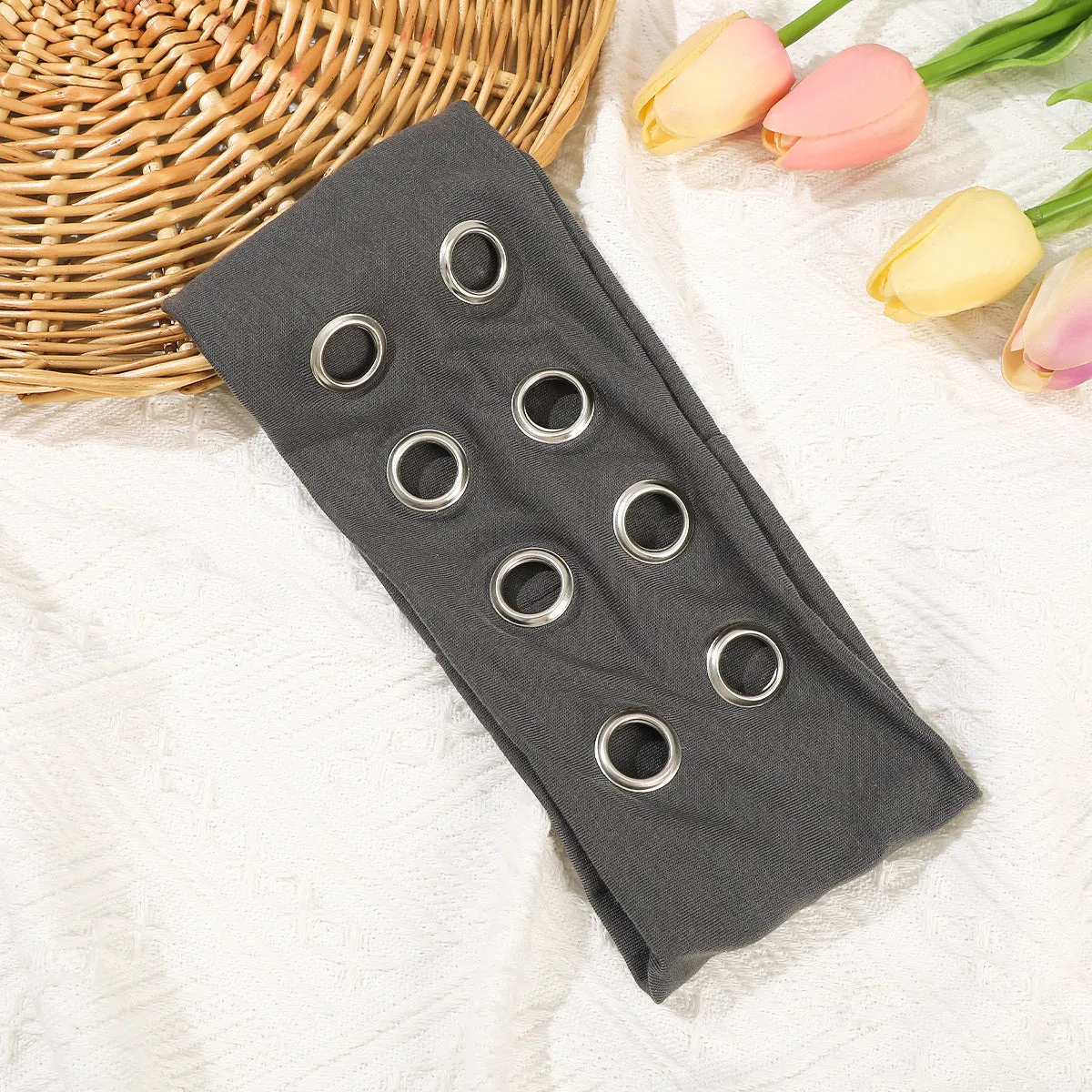 Black polyester hair band with integrated hollow metal circle in punk style.