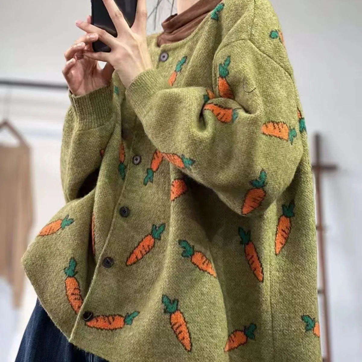 Loose round neck cardigan with Mori artistic colour contrast print, shown in viscose fabric.