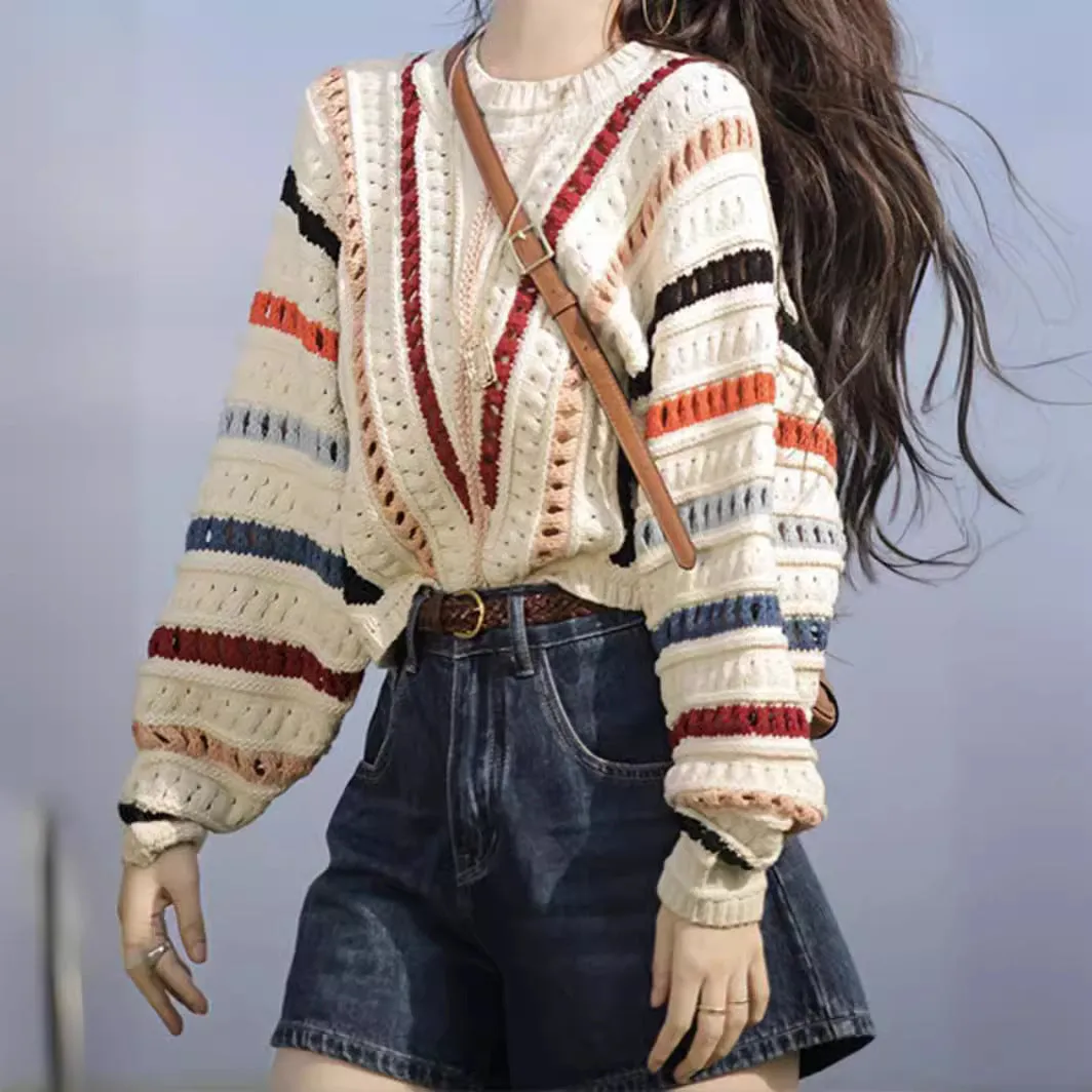 Women's rainbow striped loose sweater with batwing sleeves and hollow knit pattern