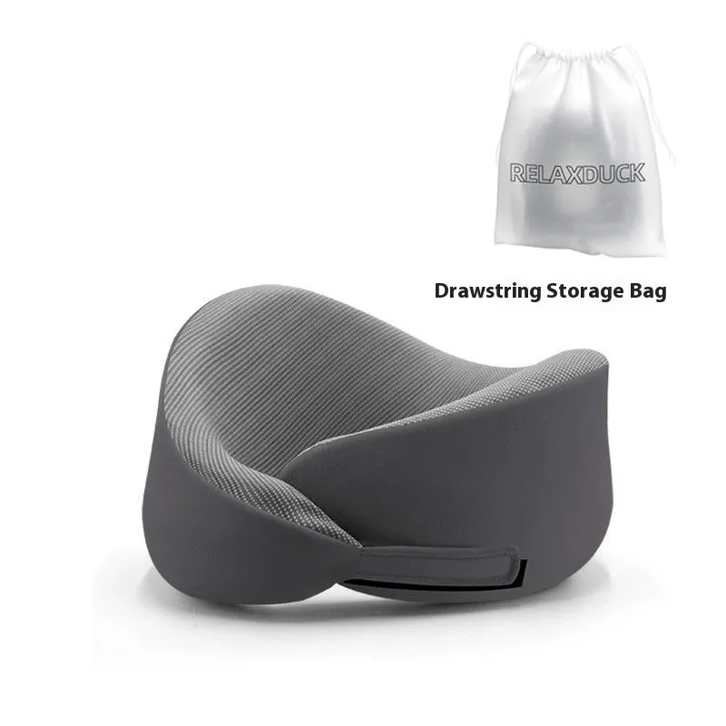 Light grey U-shaped memory foam neck pillow on a white background.