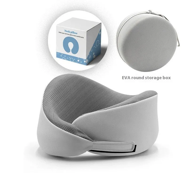 Light grey U-shaped memory foam neck pillow on a white background.