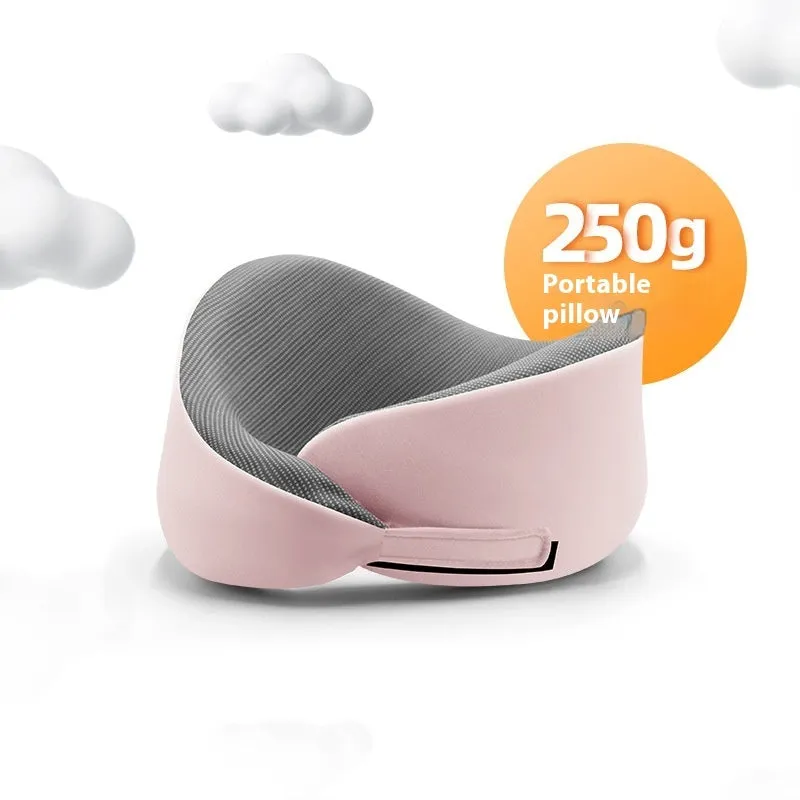 Light grey U-shaped memory foam neck pillow on a white background.