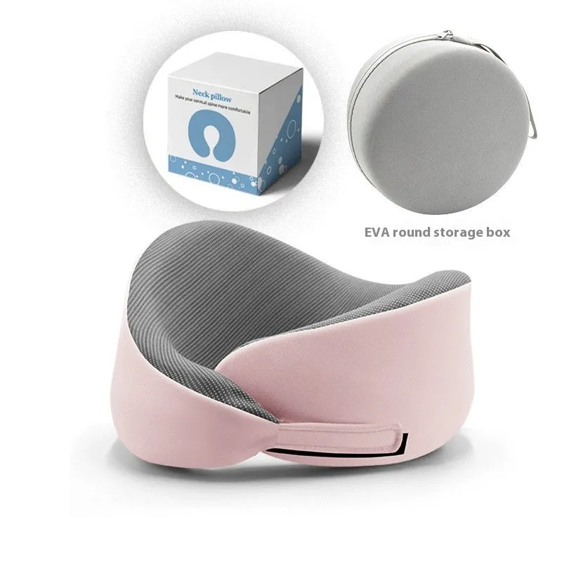Light grey U-shaped memory foam neck pillow on a white background.