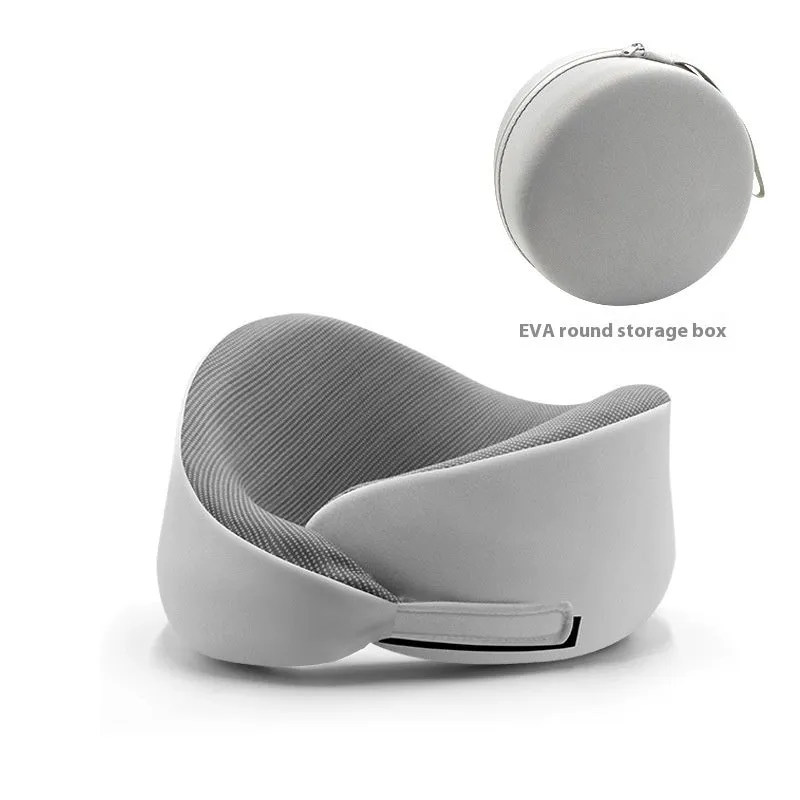 Light grey U-shaped memory foam neck pillow on a white background.