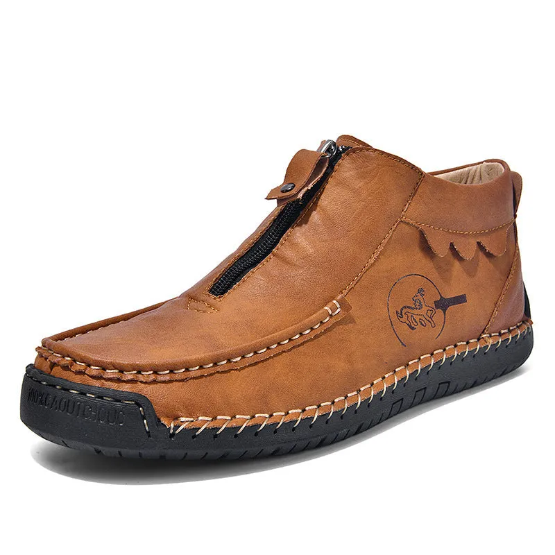 Men's black slip-on loafers with round toe and stitched sole on a plain background