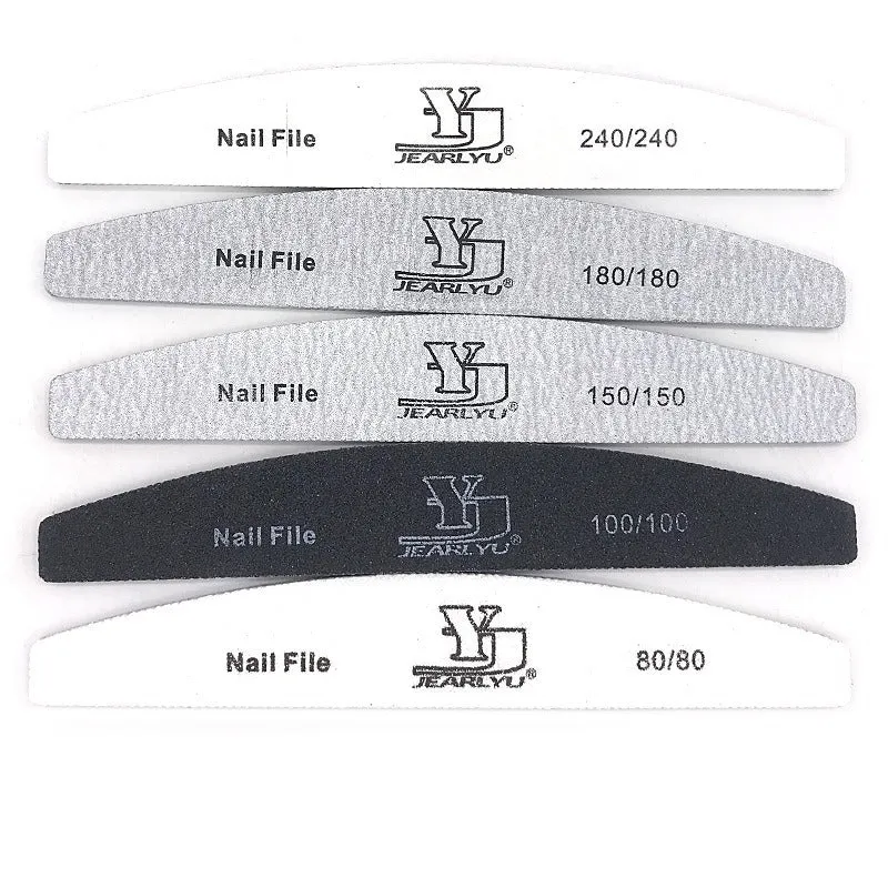 Grey half-moon shaped foam nail file on a plain background.