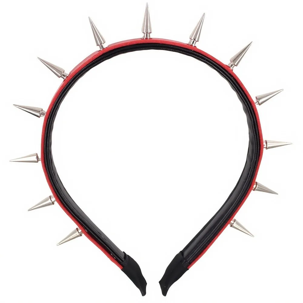 Punk rivet headband in black metal with tapered pointed nail spikes, unisex hair accessory on a solid background