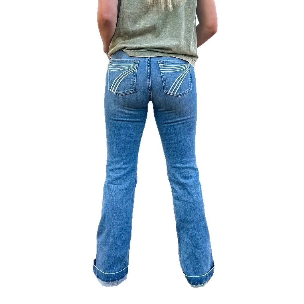 Women's slim fit blue embroidered jeans with a slight flare and mid-rise waist.