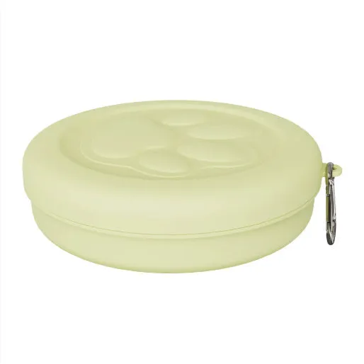 Collapsible two-layer silicone dog travel bowl in light pink and green, showing food and water compartments.