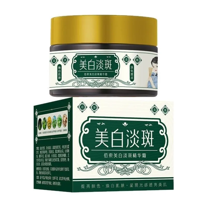 Baishu skin whitening and spots lightening essence cream in a 30g bottle with white and gold label