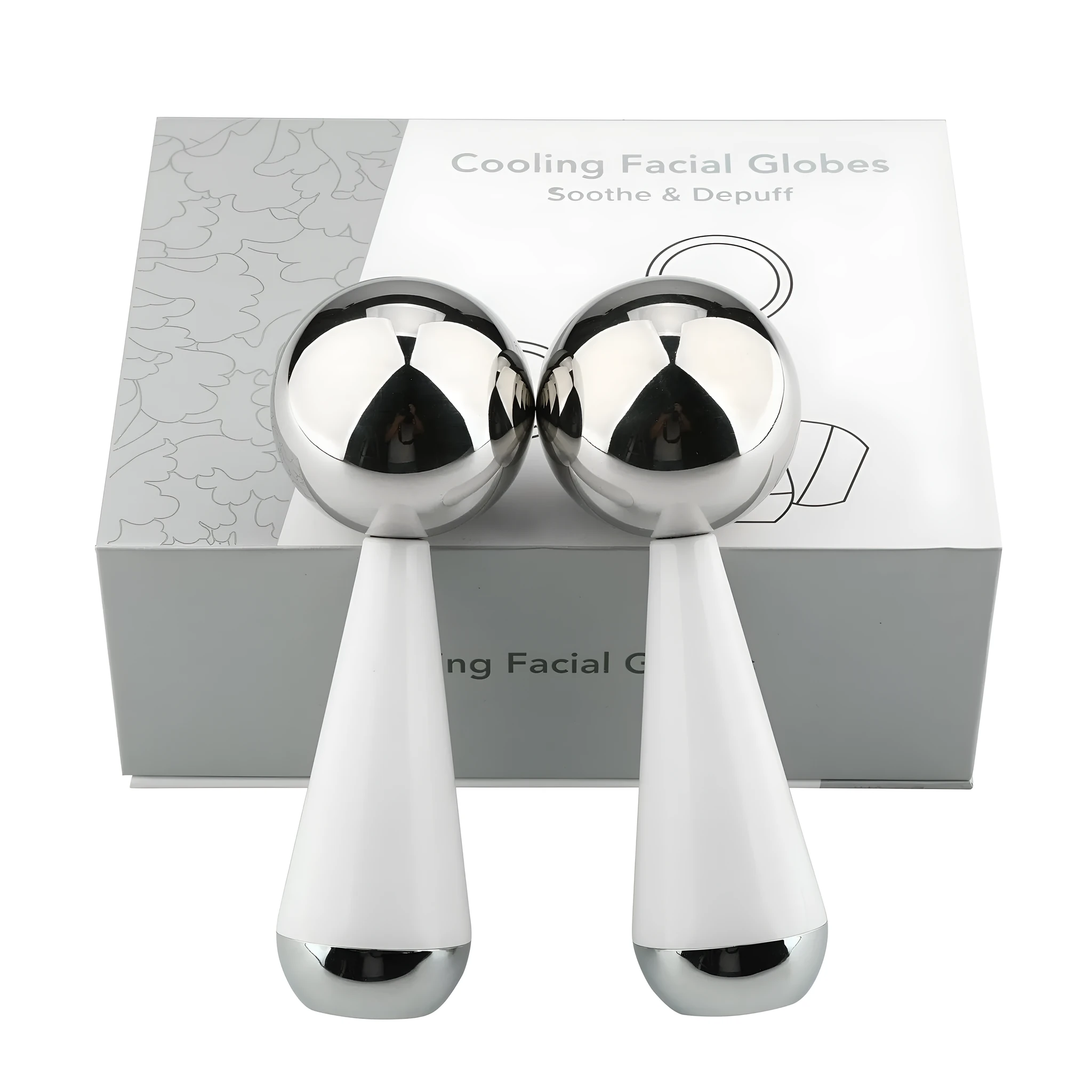 Silver stainless steel facial ice roller measuring 145x50mm on a clean surface
