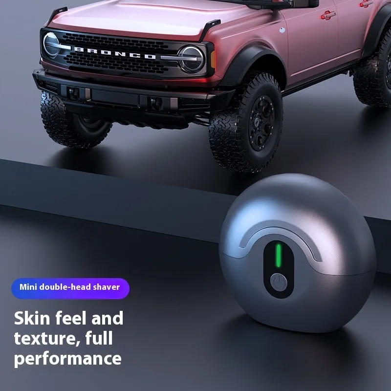 Black and grey portable waterproof magnetic shaver with brushless motor and removable cutter head