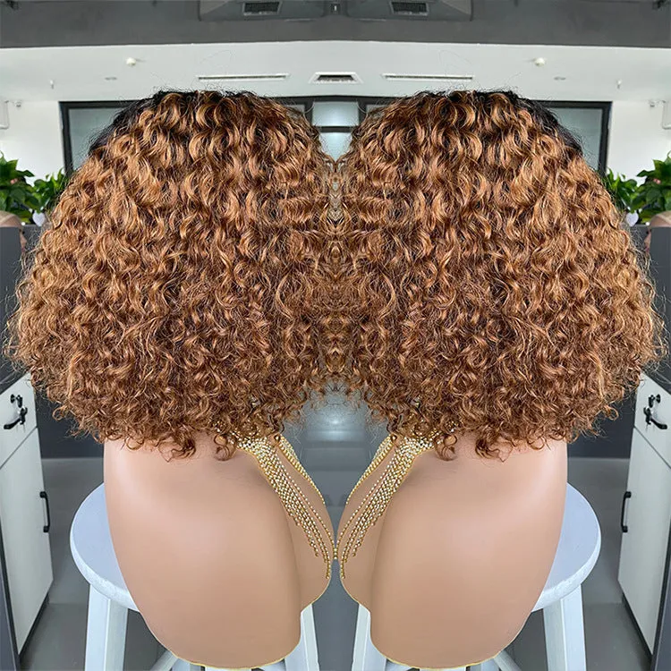 Ombre curly human hair lace wig in black with oblique bangs on a mannequin head