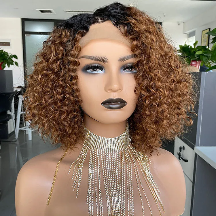 Ombre curly human hair lace wig in black with oblique bangs on a mannequin head