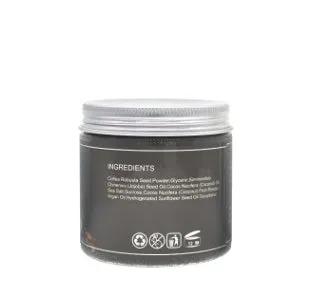 Jar of Coconut Oil Coffee Scrub exfoliating deep cleansing granules with coffee and coconut oil ingredients