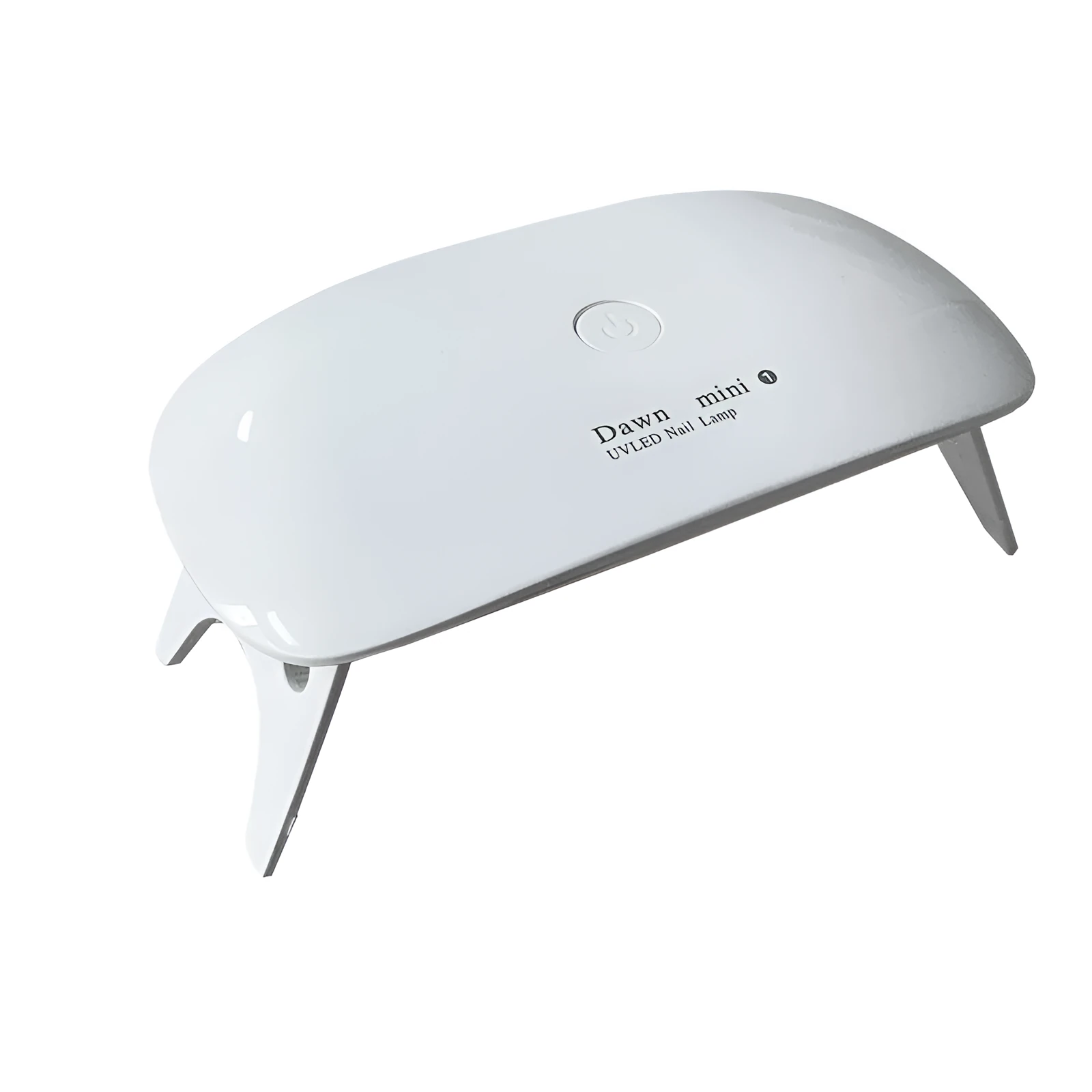 Portable nail dryer in white colour with phototherapy lamp and sealing function on a table
