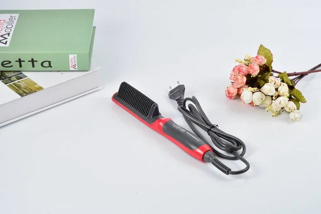 Black and red ceramic hair straightening brush with heated teeth and LED display on white background