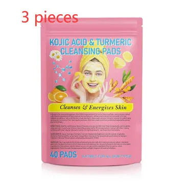 Yellow compressed turmeric cleansing pad with kojic acid, made of sponge material, for facial cleansing