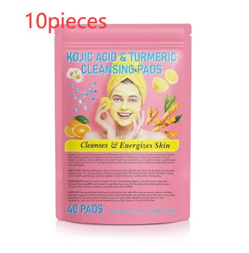 Yellow compressed turmeric cleansing pad with kojic acid, made of sponge material, for facial cleansing