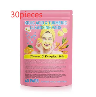 Yellow compressed turmeric cleansing pad with kojic acid, made of sponge material, for facial cleansing