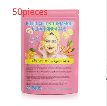 Yellow compressed turmeric cleansing pad with kojic acid, made of sponge material, for facial cleansing