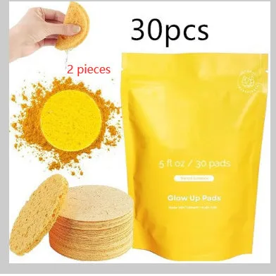 Yellow compressed turmeric cleansing pad with kojic acid, made of sponge material, for facial cleansing