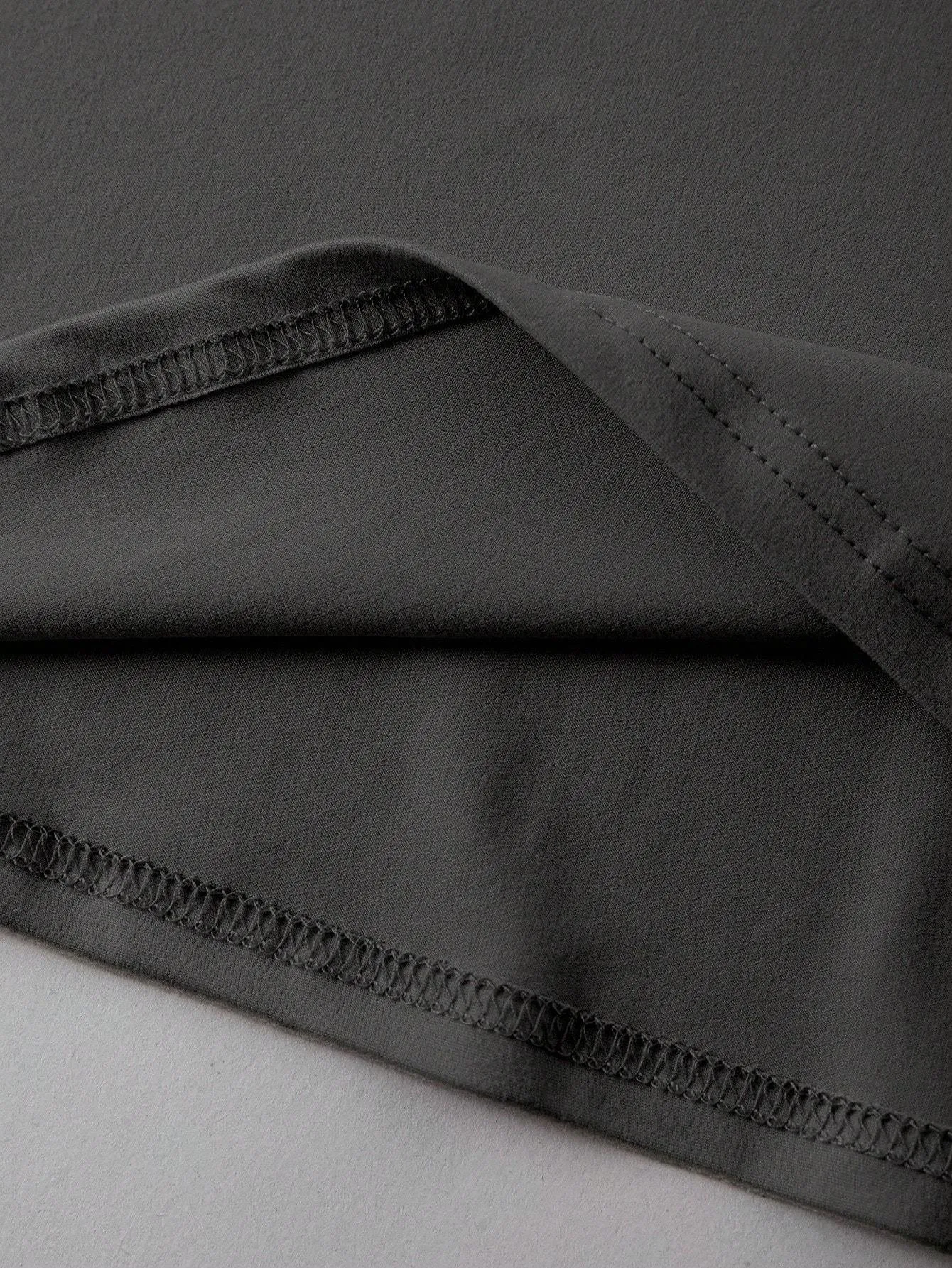 Loose straight cut cotton t-shirt in summer colours black green grey orange