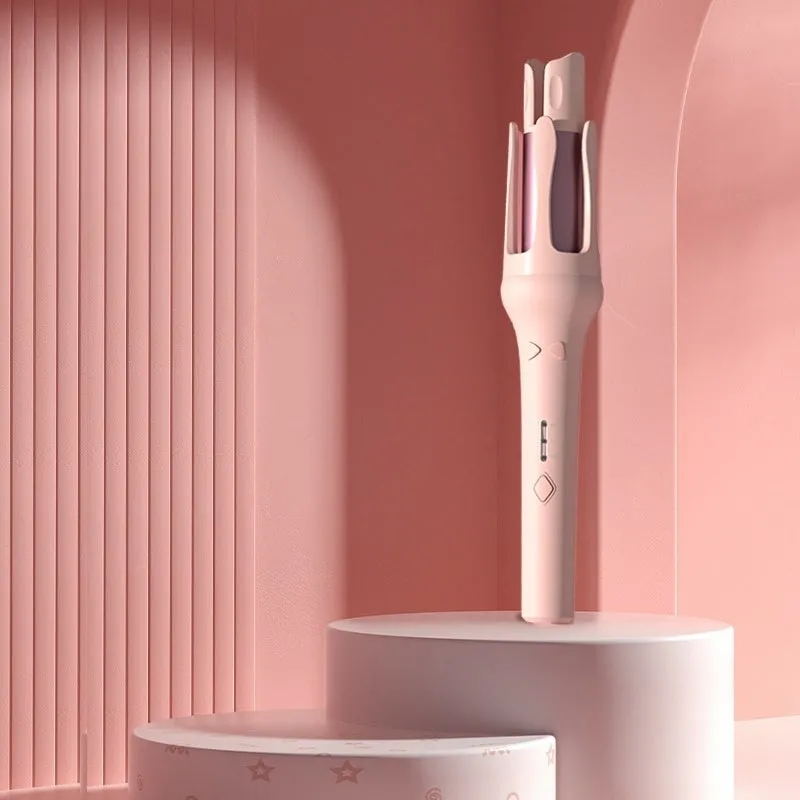 White and Chigo brand automatic hair curler with a 32mm barrel on a table.