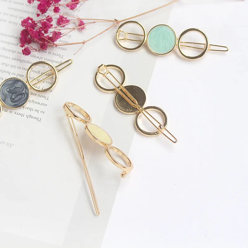 Round metal hairpin with opal crystal centre in beige colour, 7cm alloy construction