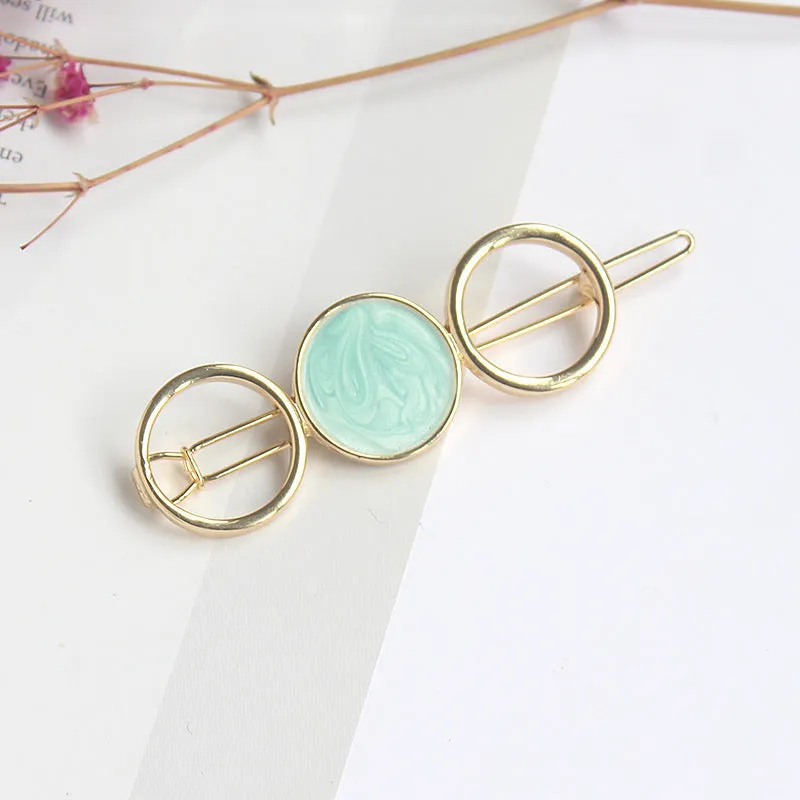 Round metal hairpin with opal crystal centre in beige colour, 7cm alloy construction