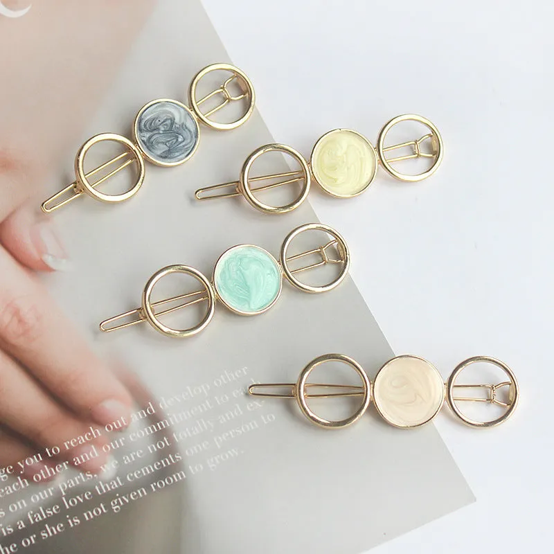 Round metal hairpin with opal crystal centre in beige colour, 7cm alloy construction