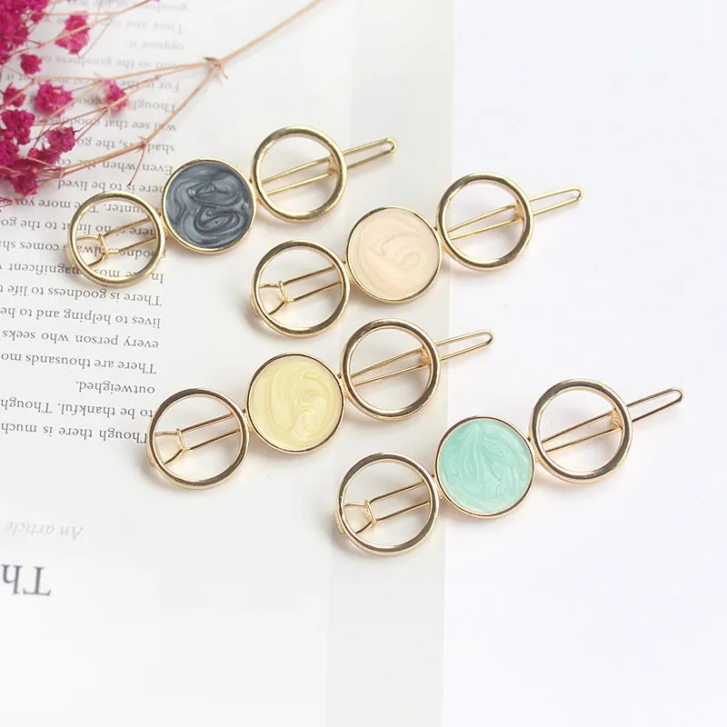 Round metal hairpin with opal crystal centre in beige colour, 7cm alloy construction
