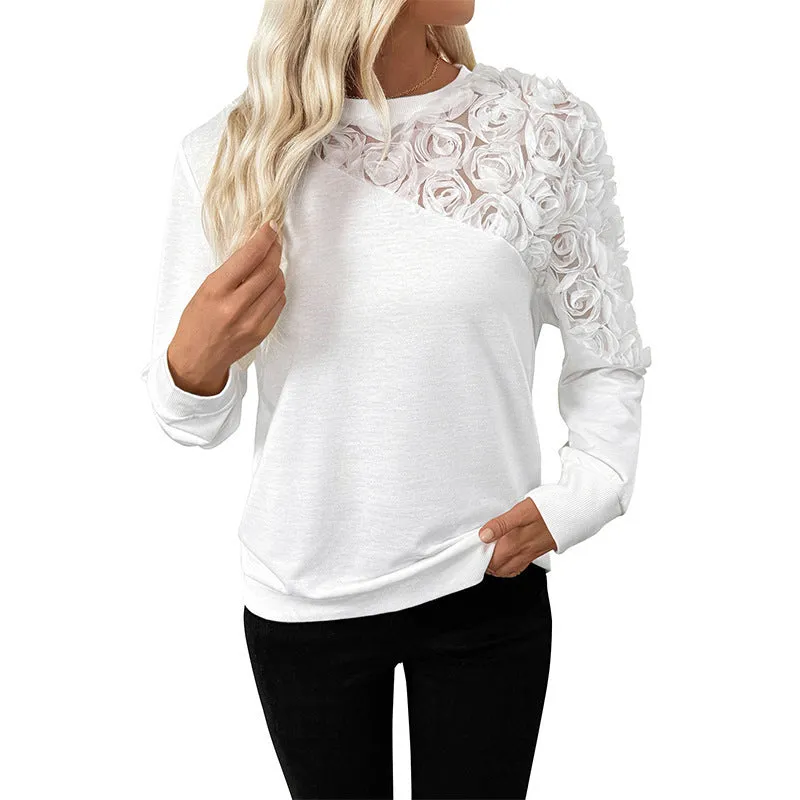 White long sleeve top with floral pattern, loose pullover style