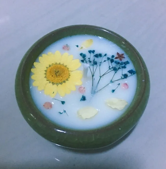 Handcrafted 10ml aromatherapy scented candle in cylindrical shape with essential oil blend