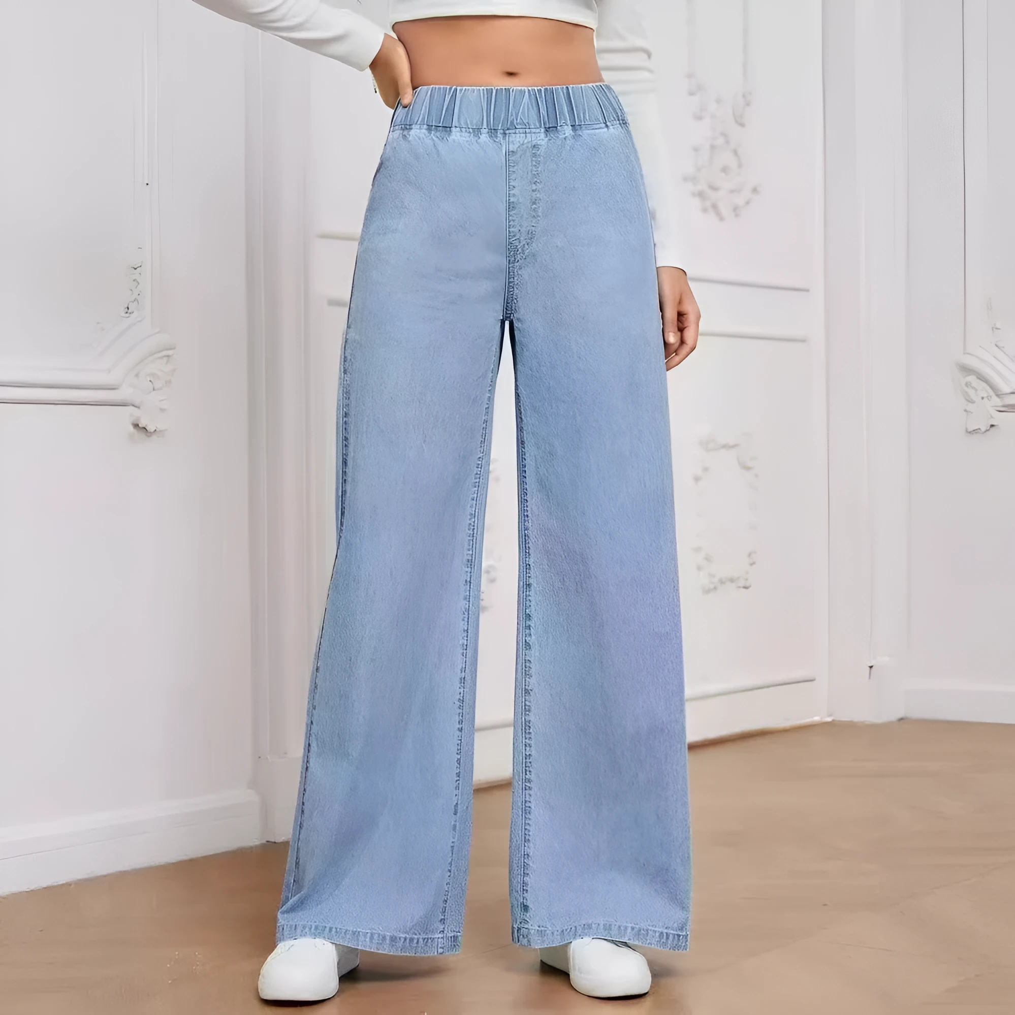 Light blue washed wide-leg plus size jeans with straight cut and zip fly opening