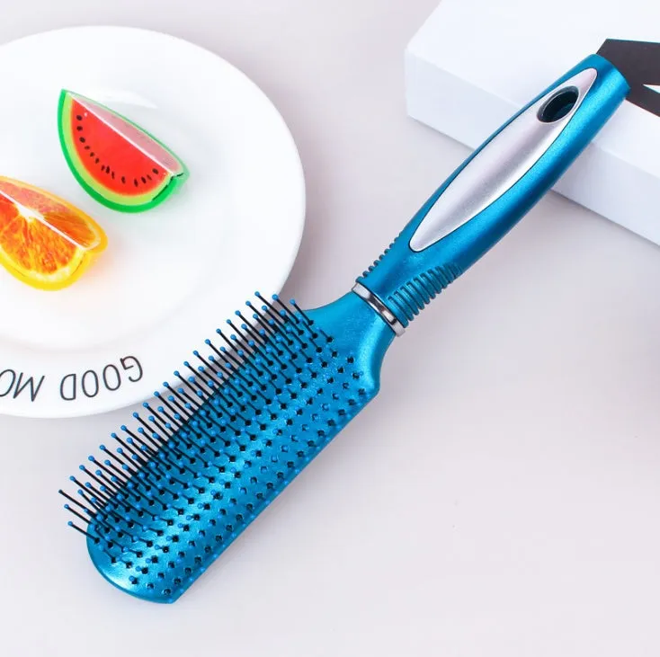 Pink electric sound wave vibration magnetic massage comb with ergonomic handle and negative ion function