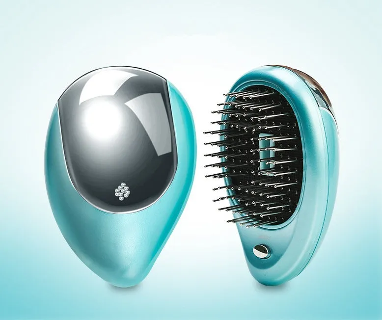 Pink electric sound wave vibration magnetic massage comb with ergonomic handle and negative ion function