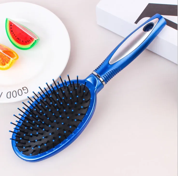 Pink electric sound wave vibration magnetic massage comb with ergonomic handle and negative ion function