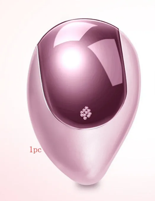 Pink electric sound wave vibration magnetic massage comb with ergonomic handle and negative ion function