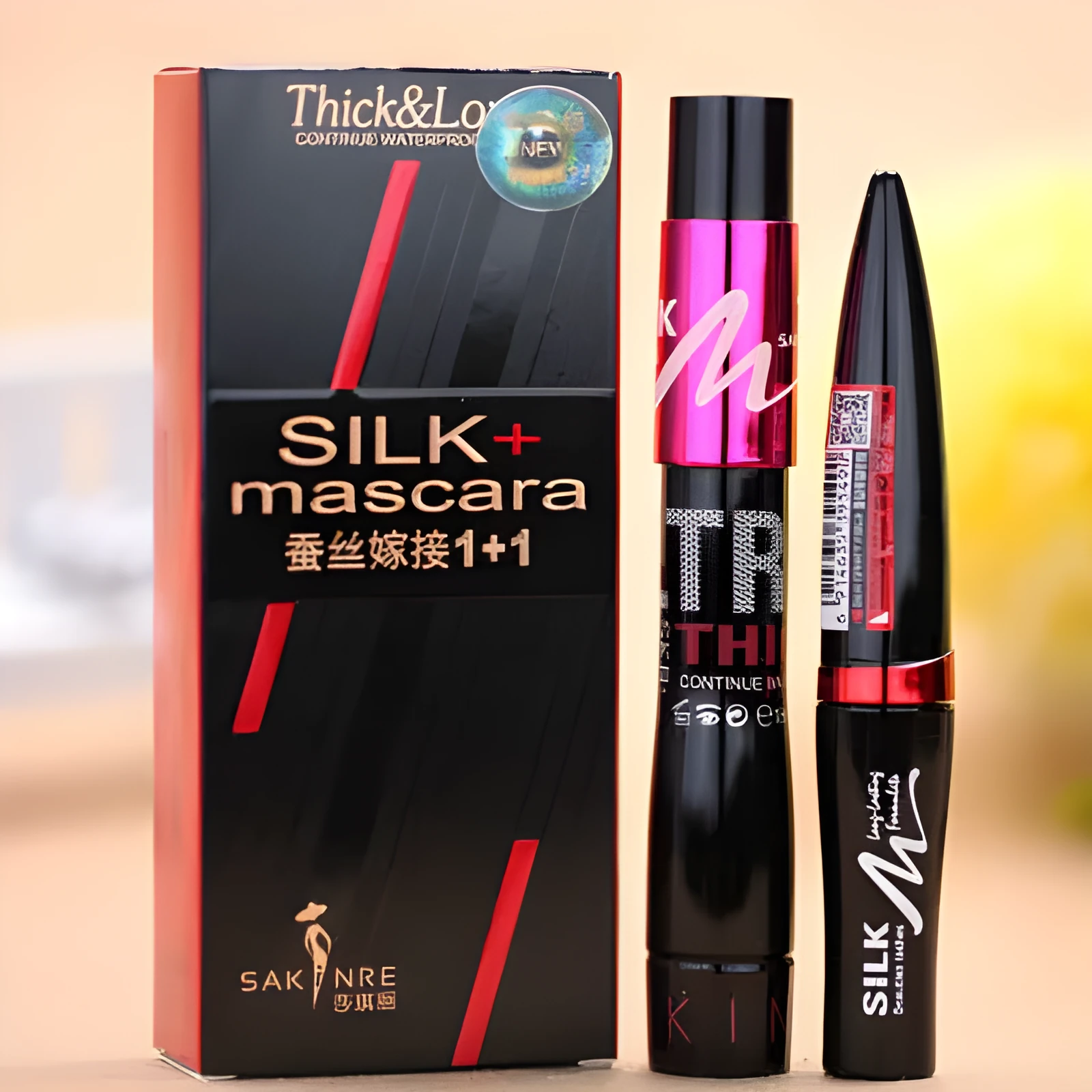 Black silk graft mascara tube with 10ml net content for thick dark lashes