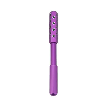Purple handheld facial massage roller with germanium particles on a white background.