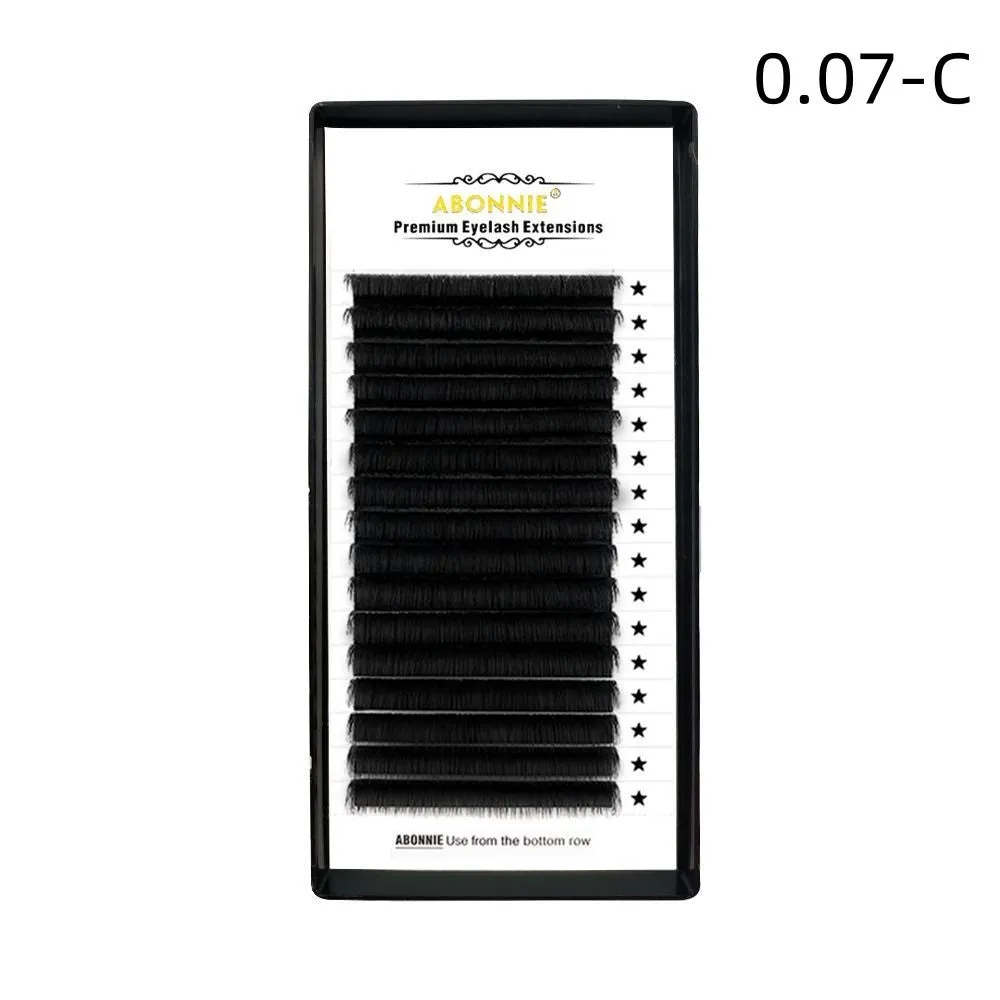 Close-up of 16-row dense false eyelashes made from mink hair on a matte round wool band.