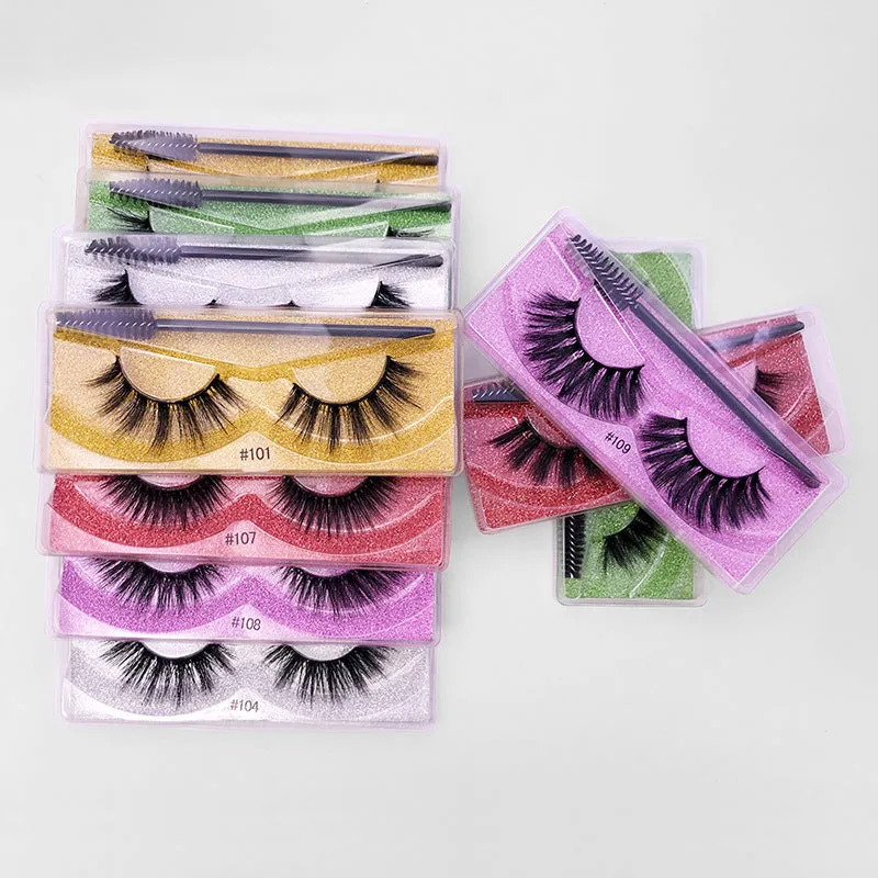 Pair of natural 3D false eyelashes with imitation mink fibres, plastic cotton thread stem, and included brush