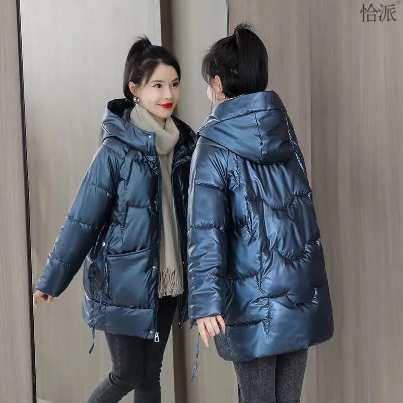 A woman's loose-fit hooded winter jacket in a thick fabric, shown in a choice of colours.