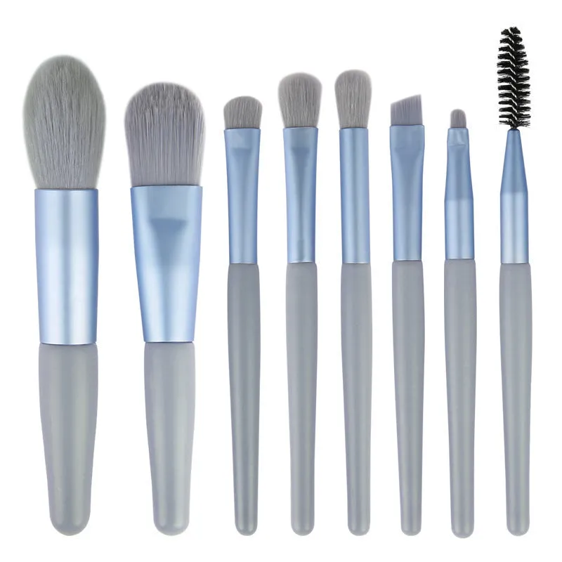 8-piece Morandi makeup brush set with fibre hair bristles in pink, blue, apricot, and green on a light background